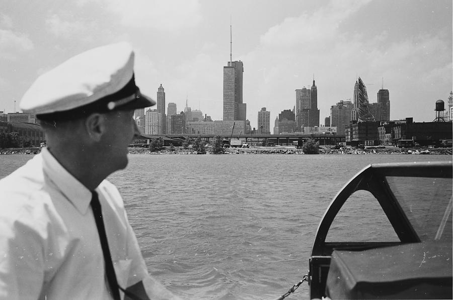 Boat Captain Looking Toward Chicago From Water - 1962 Photograph by Chicago and North Western Historical Society