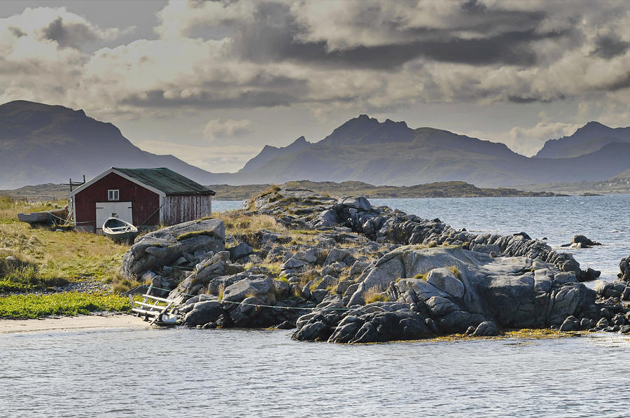 Boat house on the rocky shore of the North Atlantic on Lofoten Photograph by Ulrich Kunst And Bettina Scheidulin