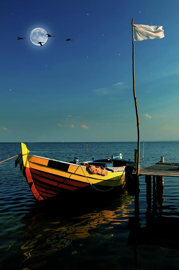 Boat in moonlight Photograph by Jaroslaw Grudzinski