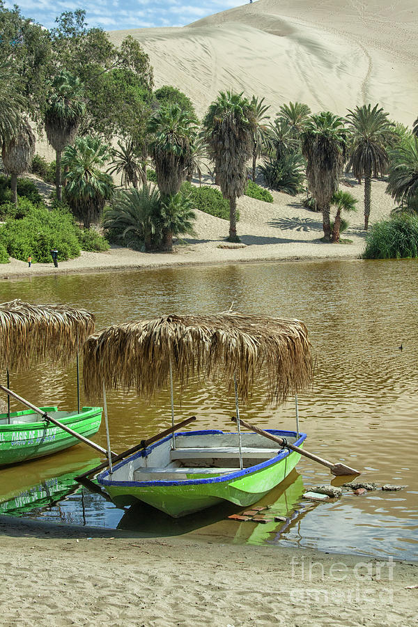 Landmark Photograph - Boat in the Huacachina lagoon in Peru by Patricia Hofmeester