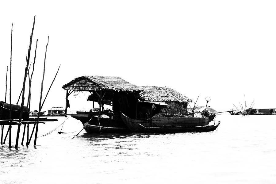 Black And White Photograph - Boat Life on the Tonle Sap by Georgia Clare