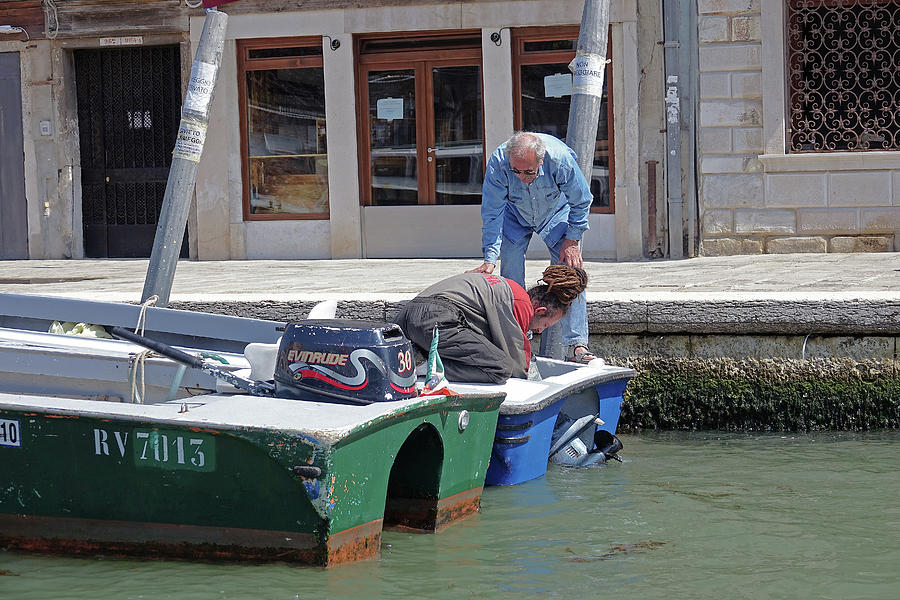 Boat Motor Repair In Venice, Italy Photograph by Rick Rosenshein