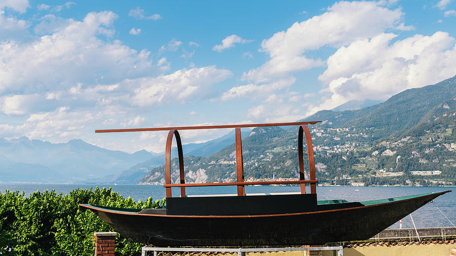 Boat next to Lake Como, Italy Photograph by Alexandre Rotenberg