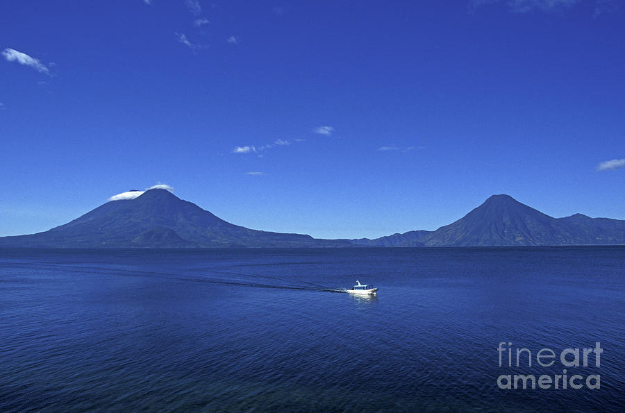Boat on Lake Atitlan Guatemala Photograph by John  Mitchell