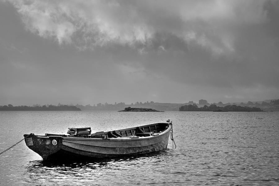 Black And White Photograph - Boat on Lough Corrib Co. Galway Ireland by Deborah Squires