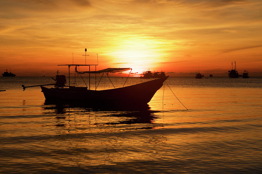 Boat On Sunrise Background Photograph