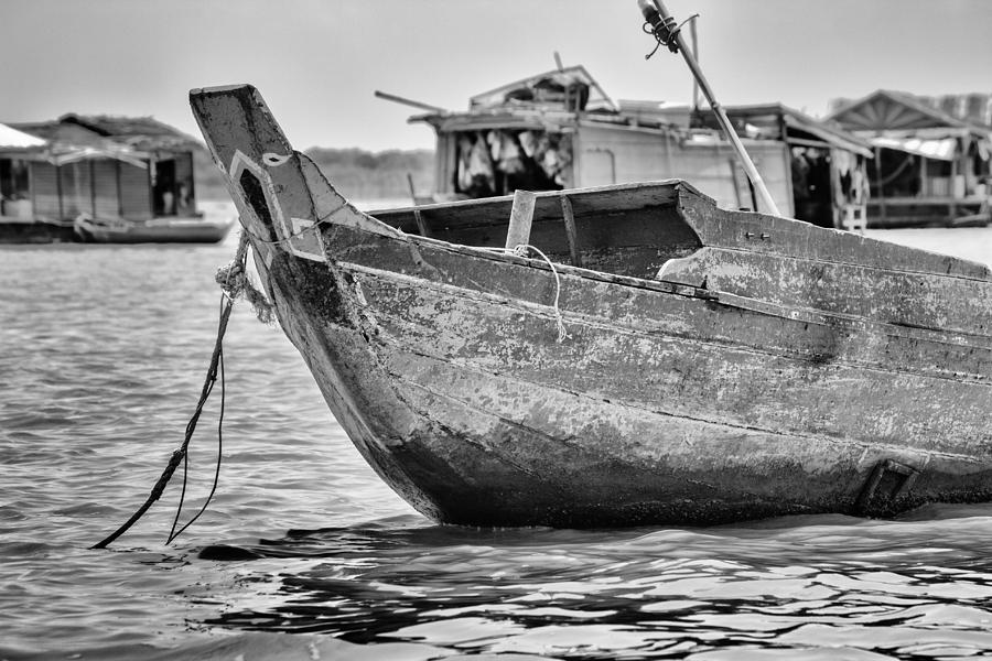 Black And White Photograph - Boat on the Tonle Sap by Georgia Clare