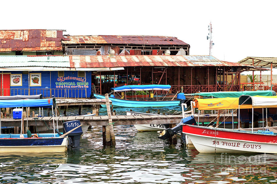 Boat Parking at Bocas del Toro Photograph by John Rizzuto