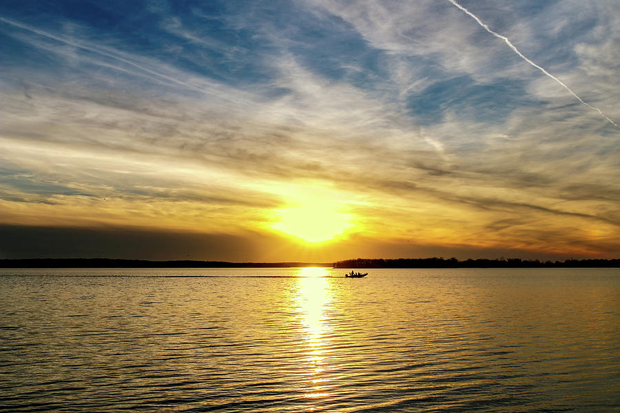 Boating at Sunset Photograph by Doug Long