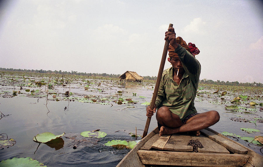 Boatman - Battambang Photograph by Patrick Klauss