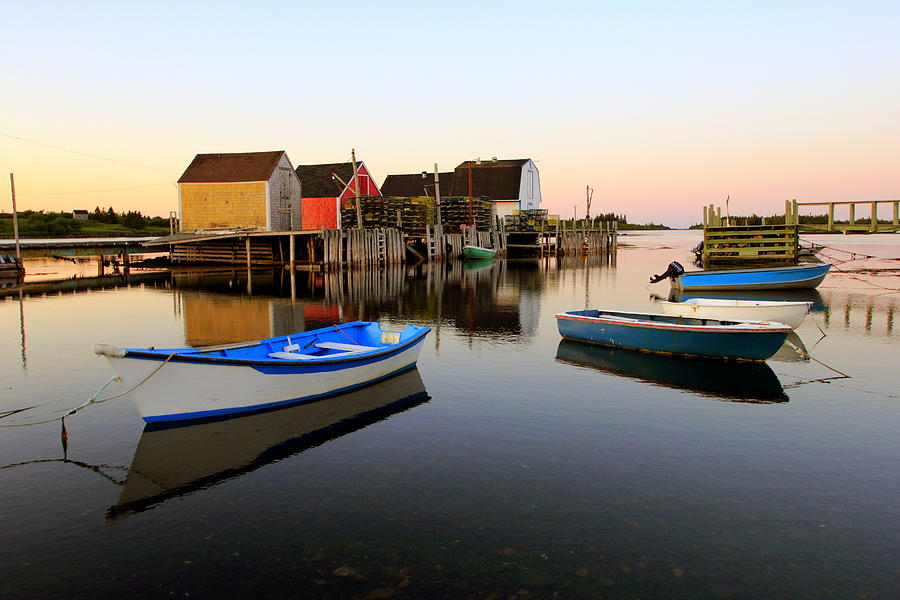 Boats and fish shacks at Blue Rocks, Nova Scotia Photograph by Gary Corbett