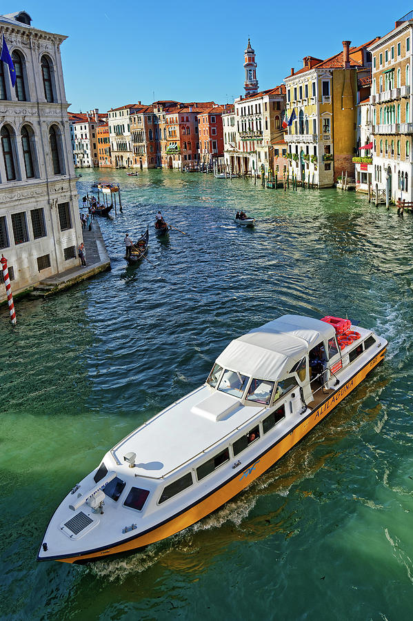 Gondolas and vaporettos, a seascape of the Grand Canal in Venice, Italy ...