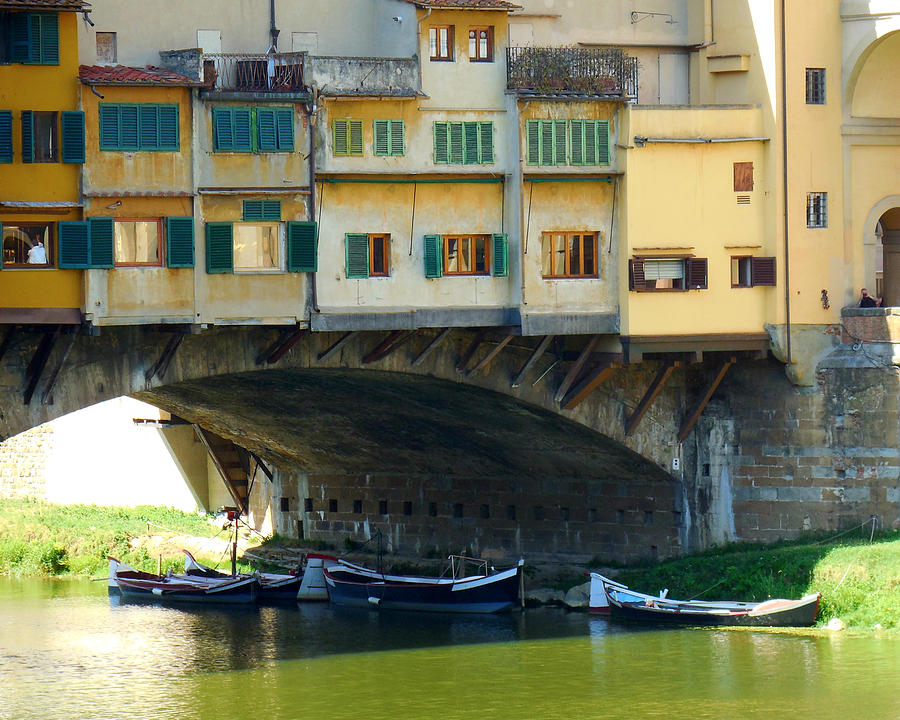 Boats Beneath the Ponte Vecchio Photograph by Valerie Reeves
