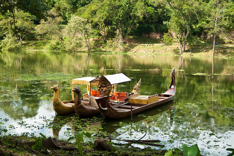 Boats in Lake Ankor Thom Photograph by James Gay
