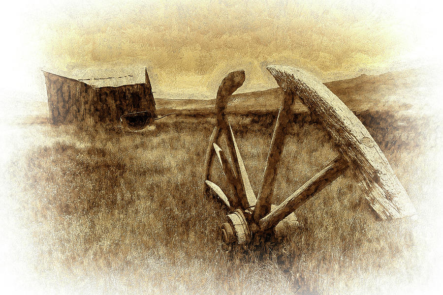 Bodie California Ghost Town Buried Wagon Wheel BW Photograph by Dan Carmichael