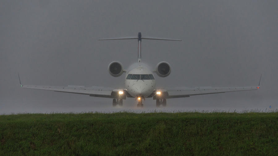 Bombardier In Heavy Rain Photograph by Guy Whiteley