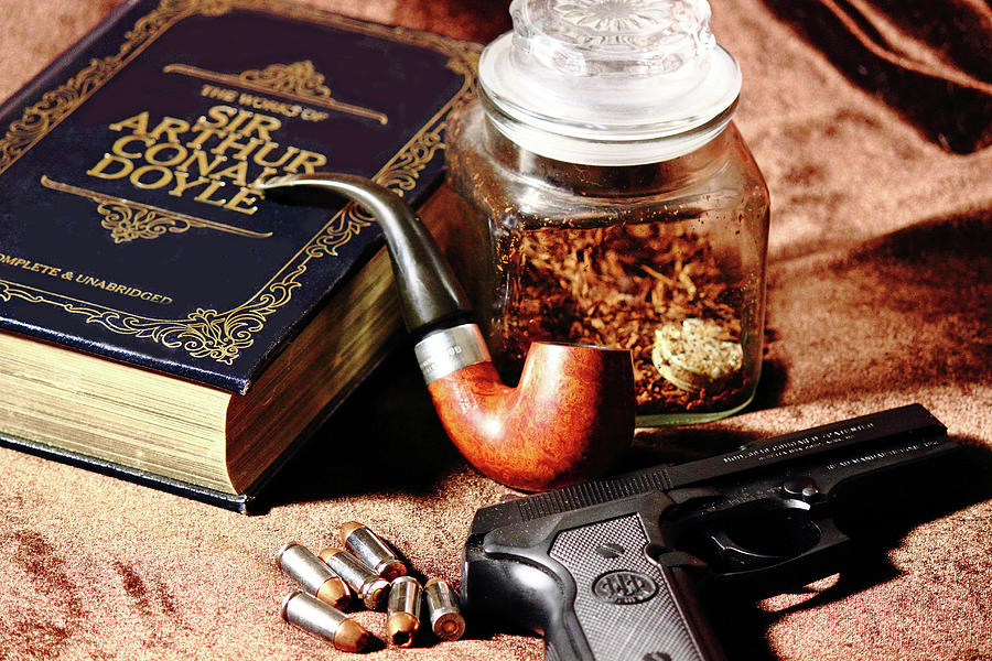 Books and Bullets Photograph by Barry Jones