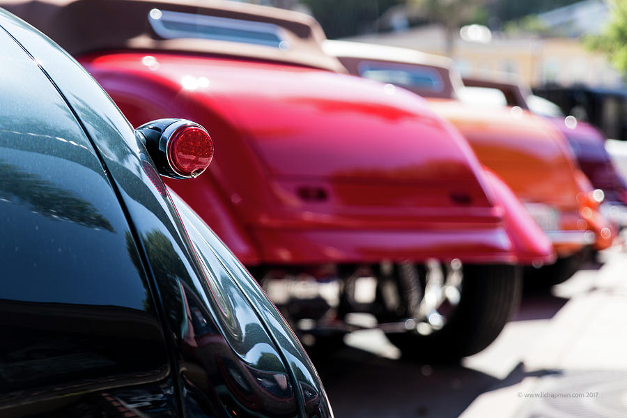 Boots of Colorful Cars Photograph by Lora Lee Chapman