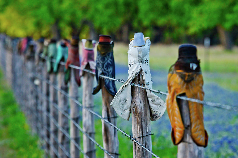 Boots on the Fence Photograph by Linda Unger