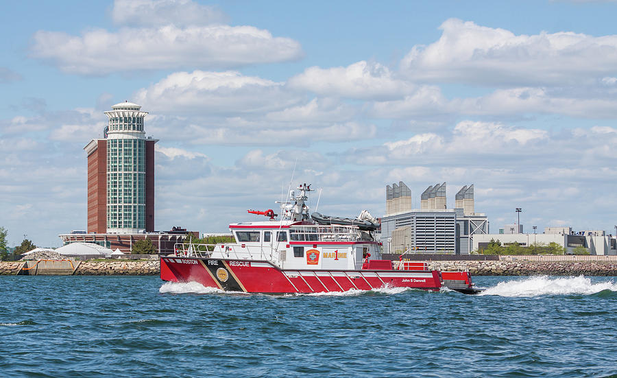 Boston Fire Rescue Boat Passing Logan Airport Photograph by Brian MacLean