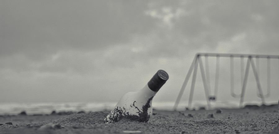Bottle in the Sand BW Photograph by Cathy Anderson