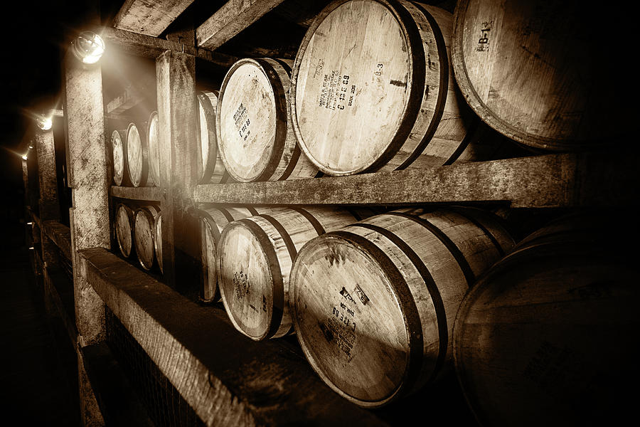 Bourbon Barrels in Spotlight Photograph by Karen Varnas