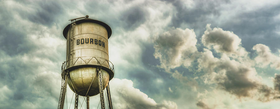 Architecture Photograph - Bourbon Whiskey Water Tower and Clouds Panorama by Gregory Ballos