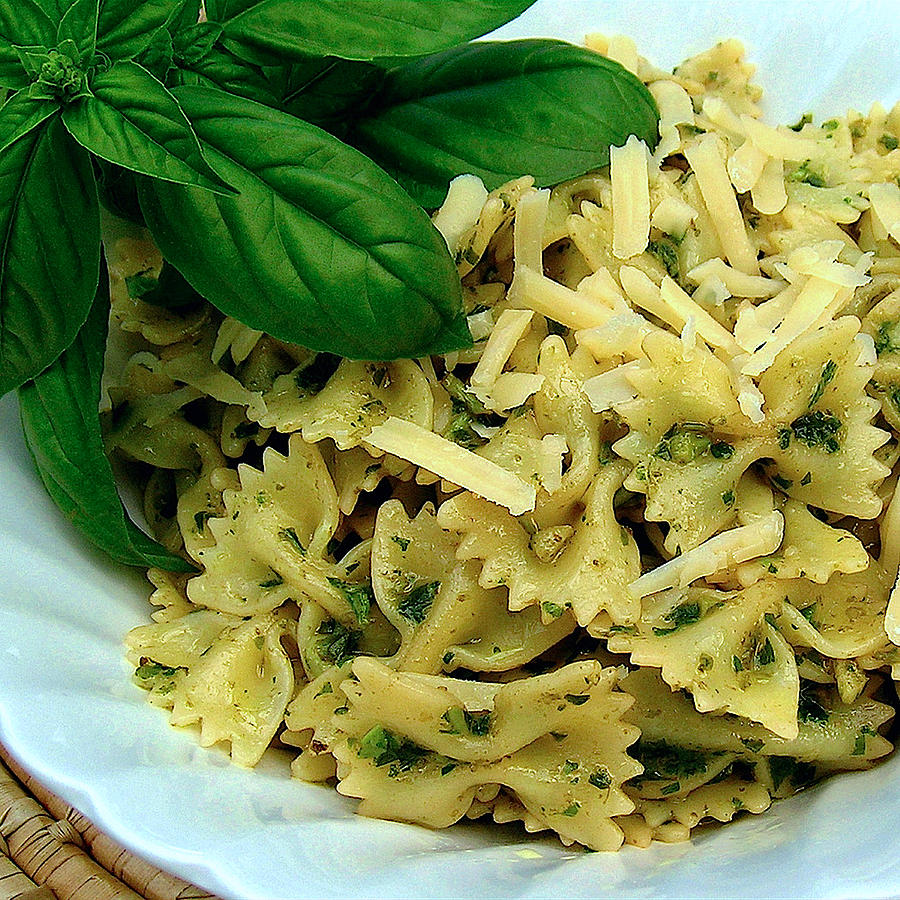 Bow-Tie Pasta with Basil Pesto Sauce and Parmesan Cheese Photograph by James Temple