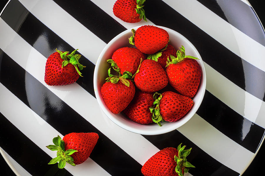 Bowl Of Strawberries On Striped Plate Photograph by Garry Gay