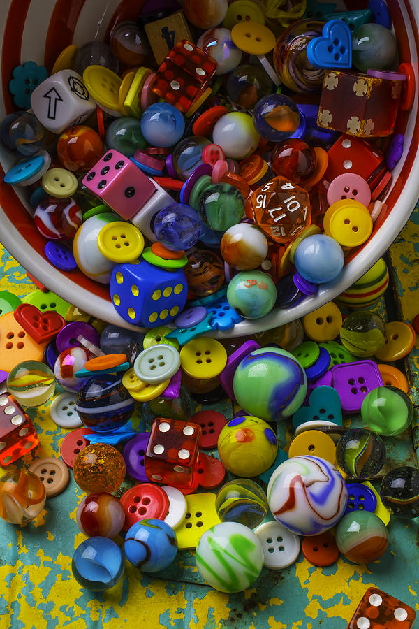 Bowl Spilling Marbles Buttons And Dice Photograph by Garry Gay