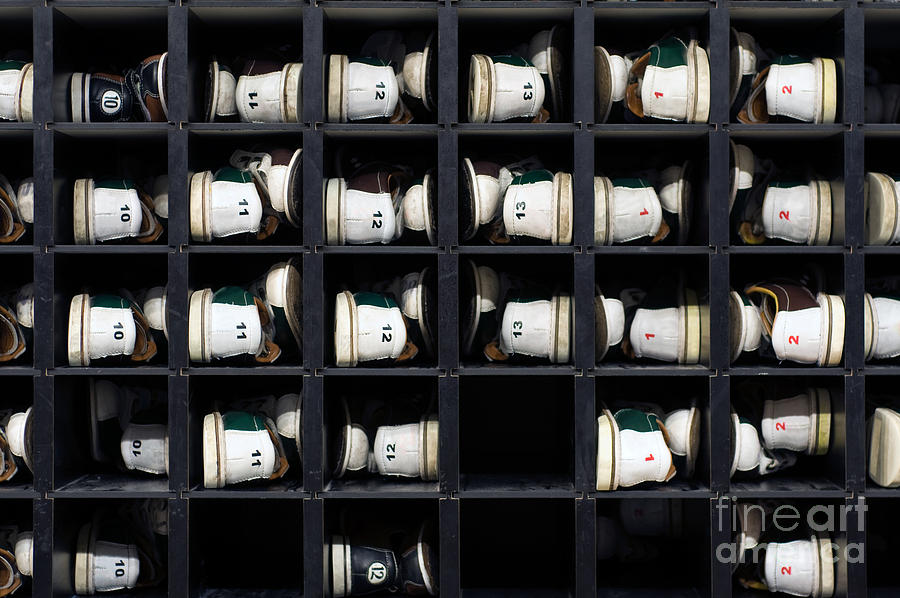 Sports Photograph - Bowling Rental Shoes in a Shoe Rack by Paul Velgos