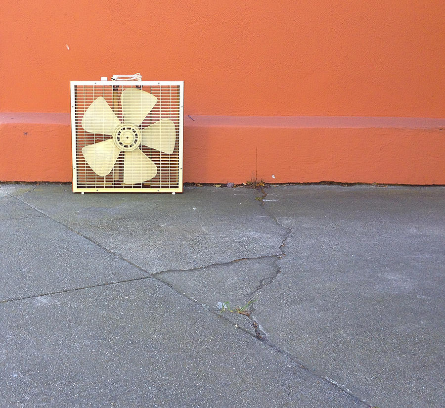 Box fan on orange Photograph by Erik Burg