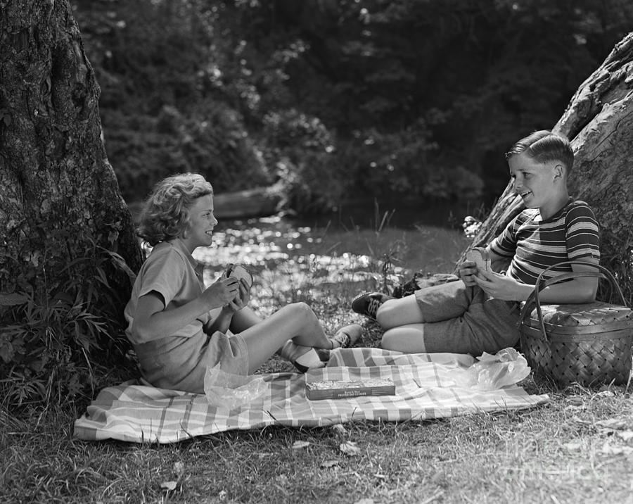 Boy And Girl On A Picnic, C.1940s Photograph by H. Armstrong Roberts/ClassicStock