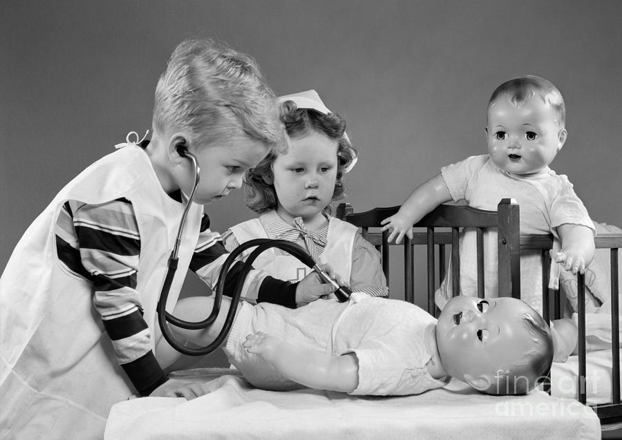 Boy And Girl Playing Doctor, C.1950s Photograph by H. Armstrong Roberts/ClassicStock