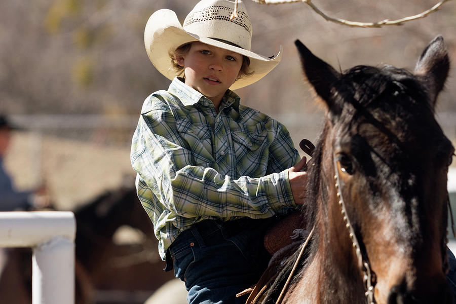 Boy and Horse Photograph by John Swartz