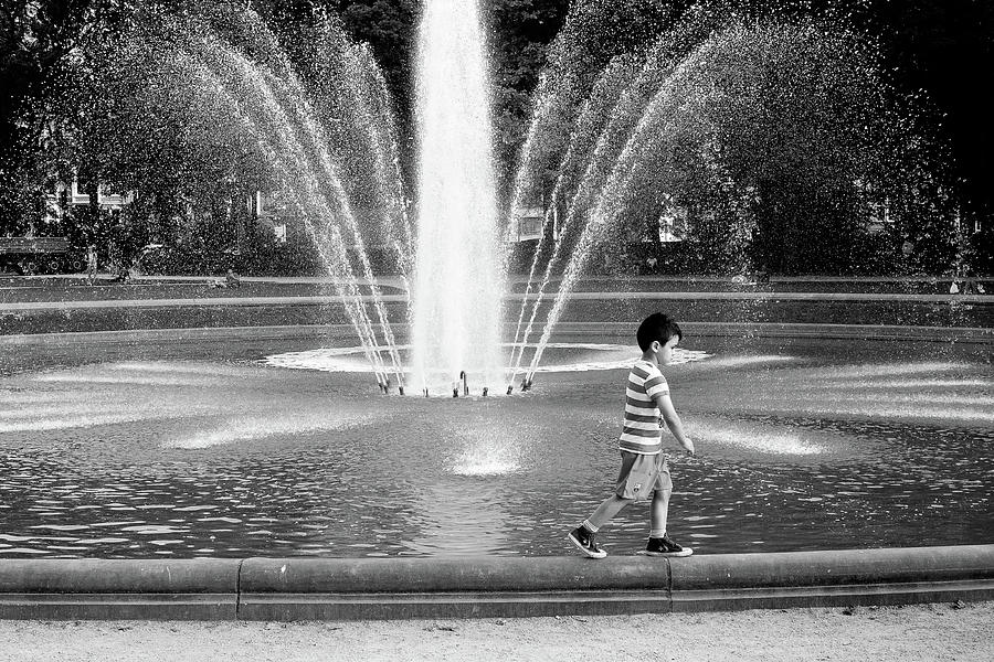 Boy At Fountain Photograph