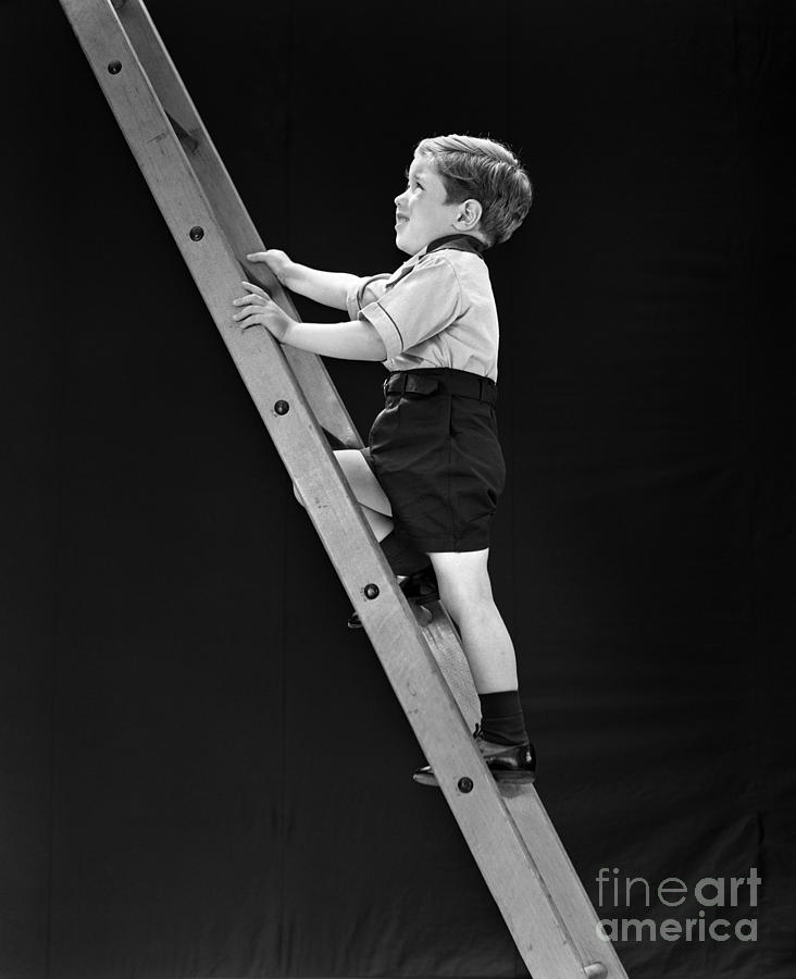 Boy Climbing Tall Ladder, C.1930s Photograph by H. Armstrong Roberts/ClassicStock