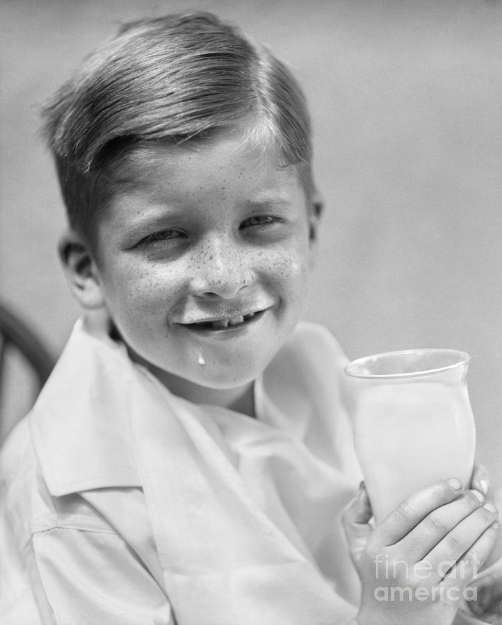 Boy Drinking Milk, C.1930s Photograph by H. Armstrong Roberts/ClassicStock