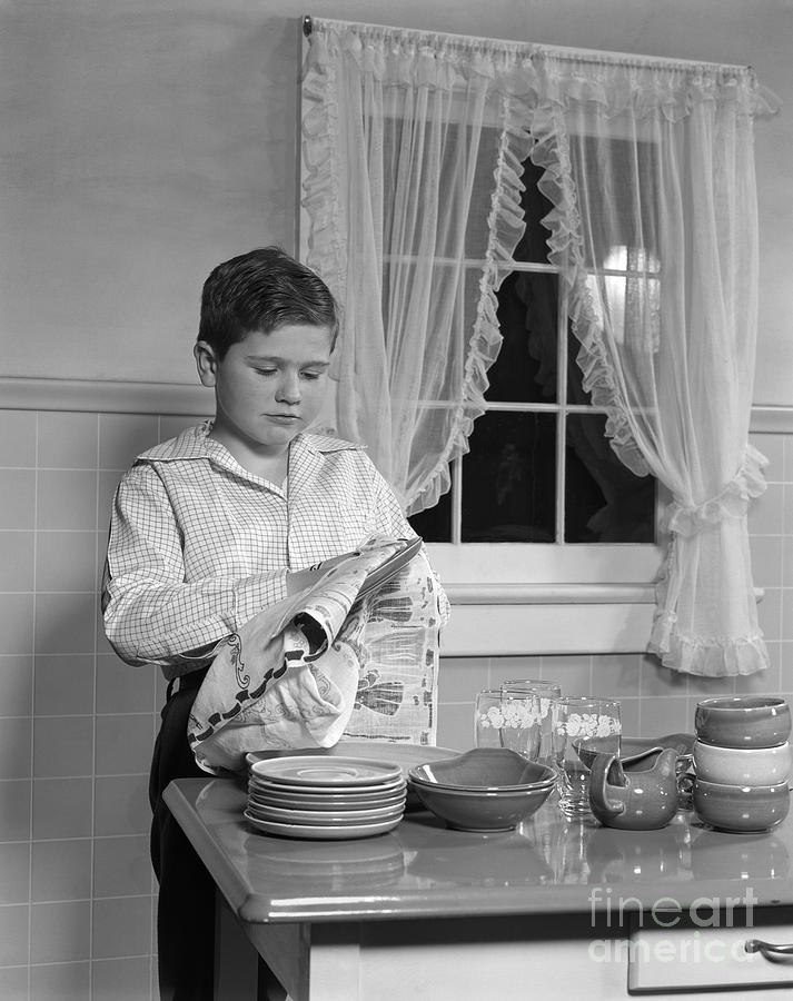 Boy Drying Dishes, C.1950s Photograph by H. Armstrong Roberts/ClassicStock