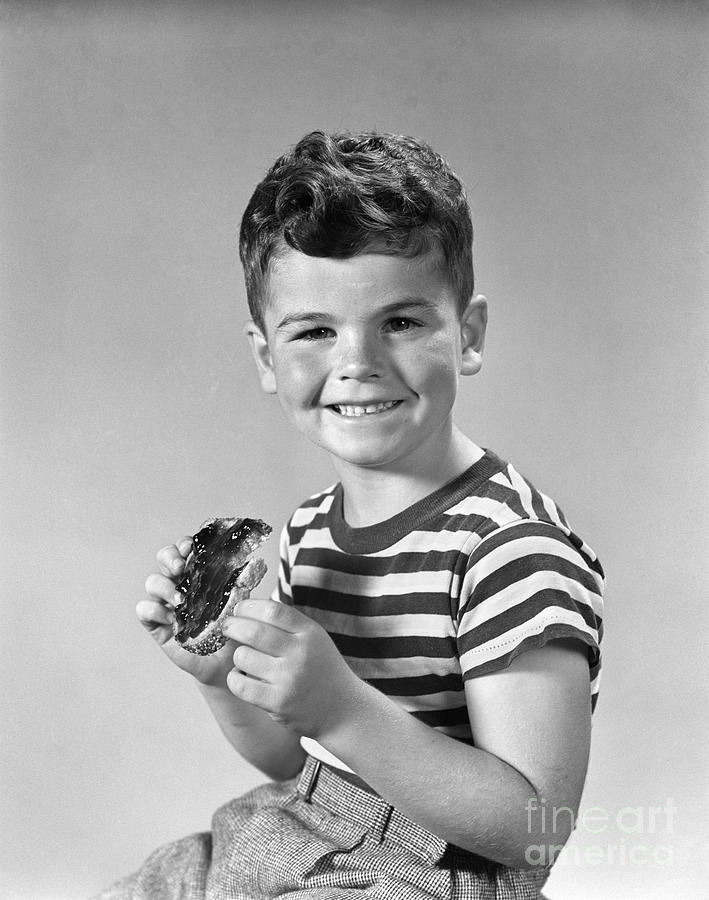 Boy Eating Bread And Jam, C.1940s Photograph by H. Armstrong Roberts/ClassicStock