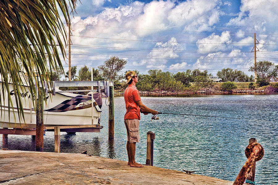 Young Man Fishing in the Florida Keys Photograph by Ginger Wakem