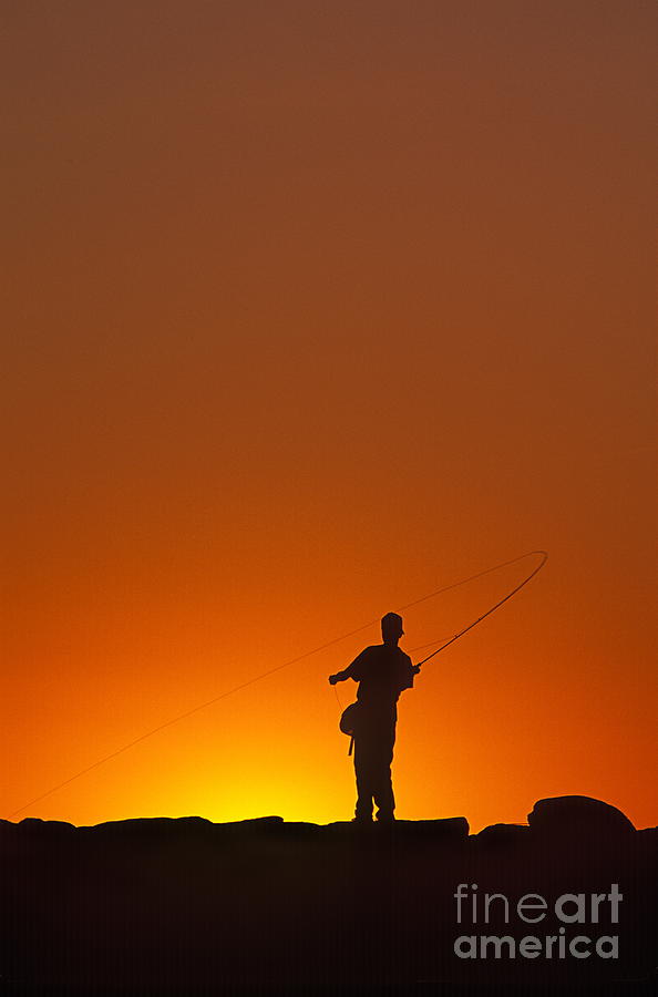 Sunset Photograph - Boy Fishing by John Greim