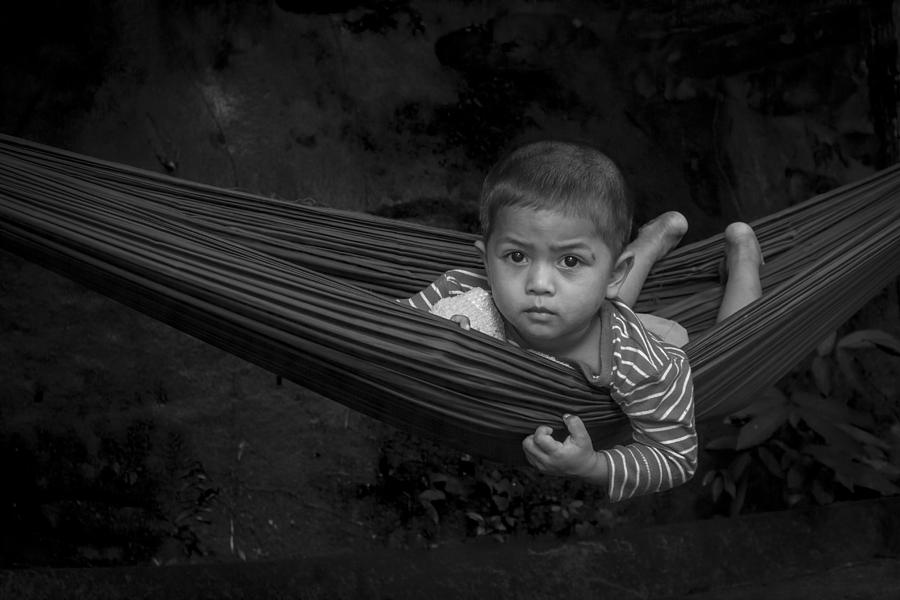 Boy in hammock Photograph by Hitendra SINKAR