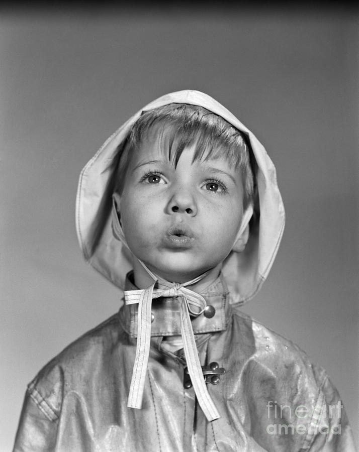 Boy In Rain Gear, C.1950s Photograph by Debrocke/ClassicStock
