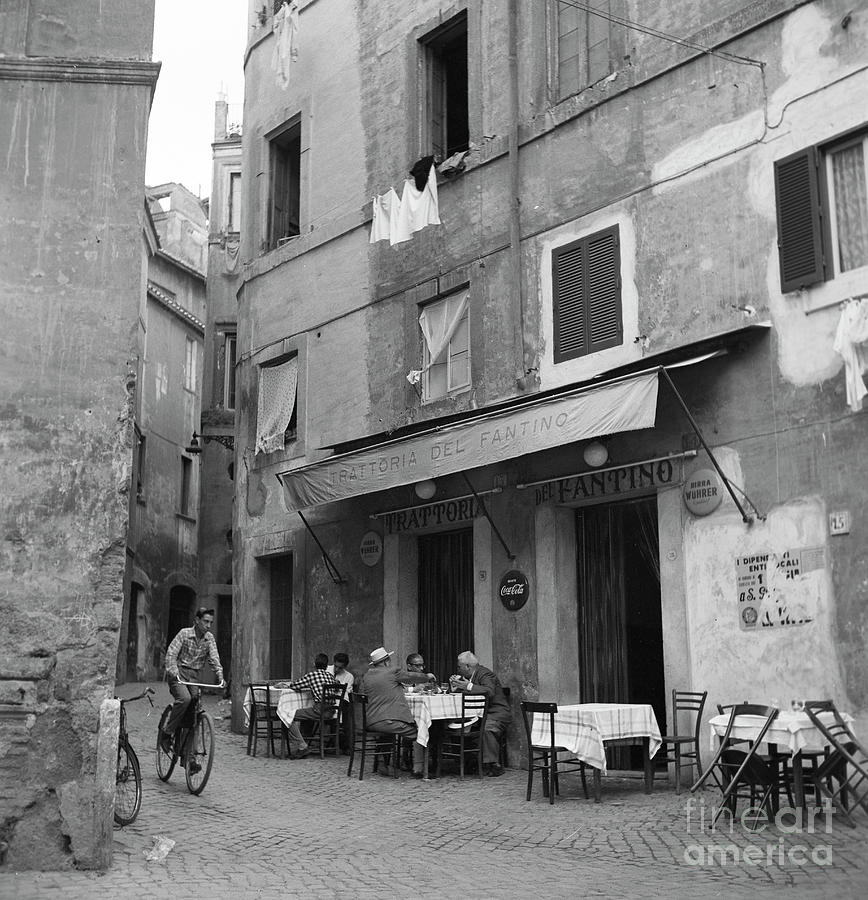 Rome Photograph - Boy on a bicycle on a street in Rome, 1955 by The Harrington Collection Rome Photograph - Boy on a bicycle on a street in Rome, 1955 by The Harrington Collection