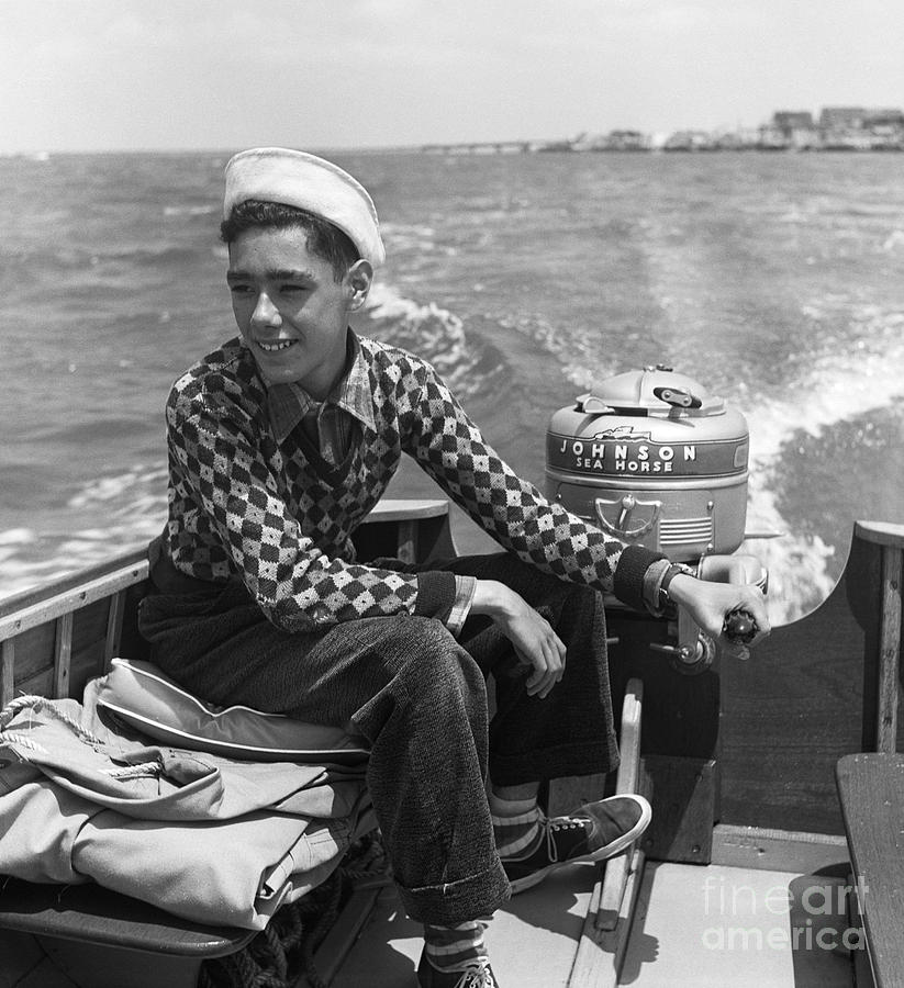 Boy Steering A Boat, C. 1950s Photograph by G. Hampfler/ClassicStock
