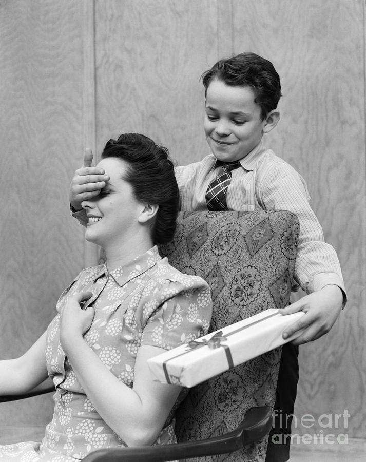 Boy Surprising Mother With Gift Photograph by H. Armstrong Roberts/ClassicStock