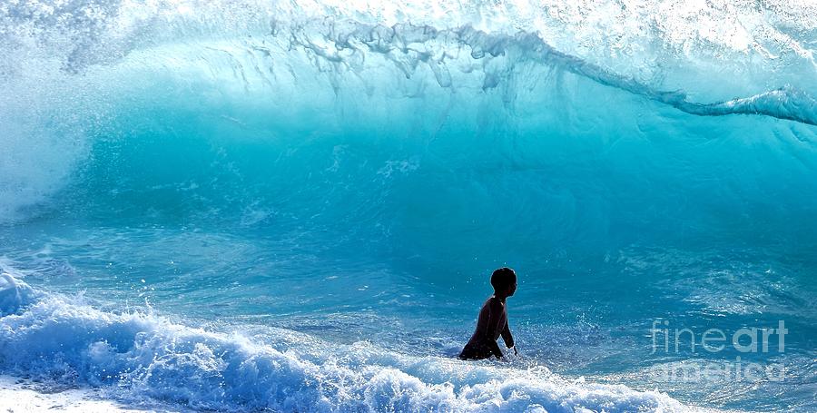 Boy waiting for wave to fall, Kekaha Beach Photograph by Debra Banks