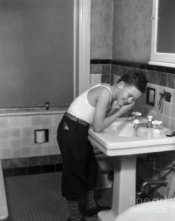 Boy Washing Face, C.1930s Photograph by H. Armstrong Roberts/ClassicStock