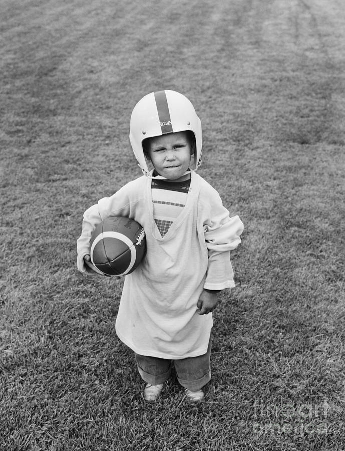 Boy With Oversized Football Gear, 1950s Photograph by H. Lefebvre/ClassicStock